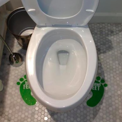Bowl Feet markers installed on bathroom tile